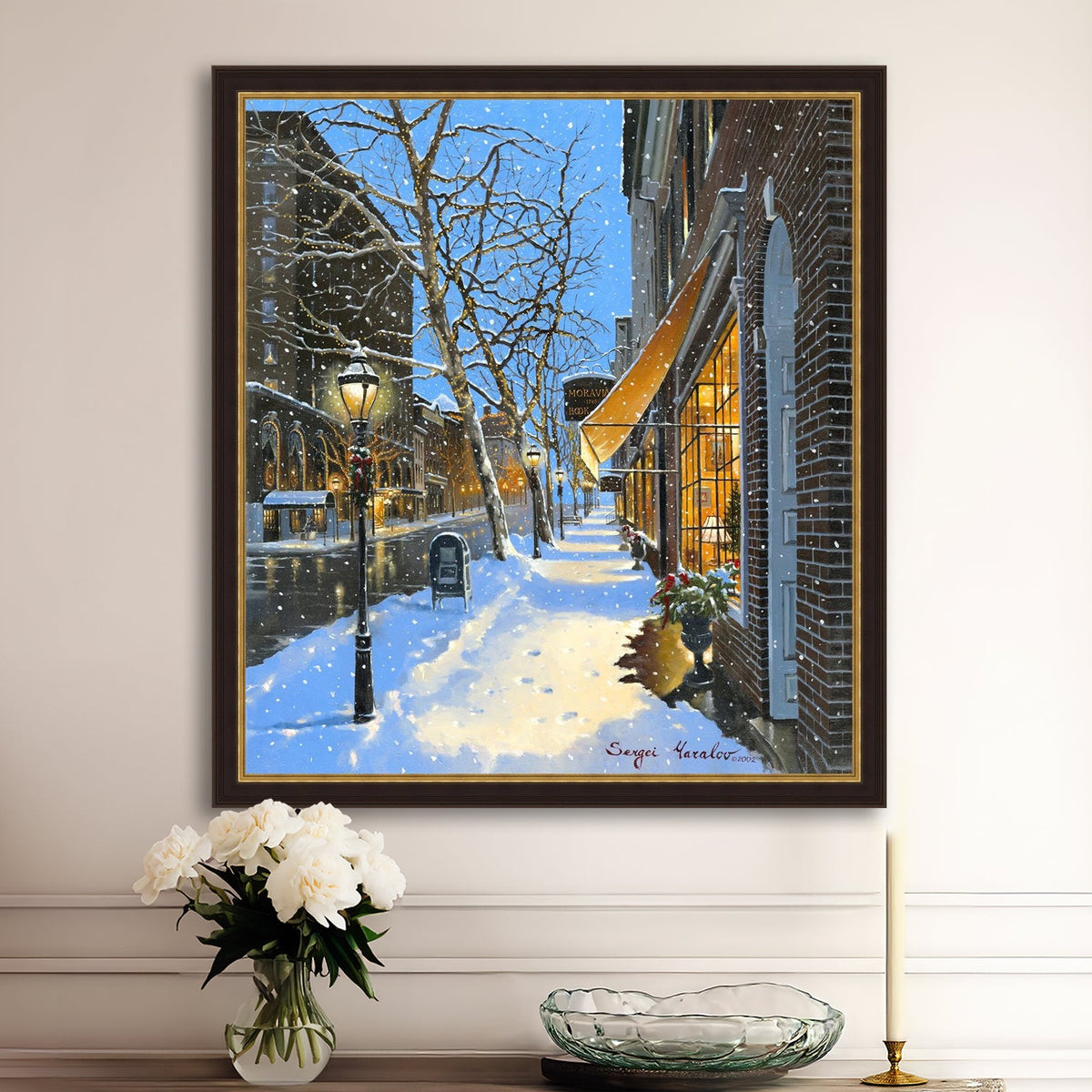 A canvas print of Moravian Bookshop, a snowy street scene in Bethlehem with footprints on the snow.
