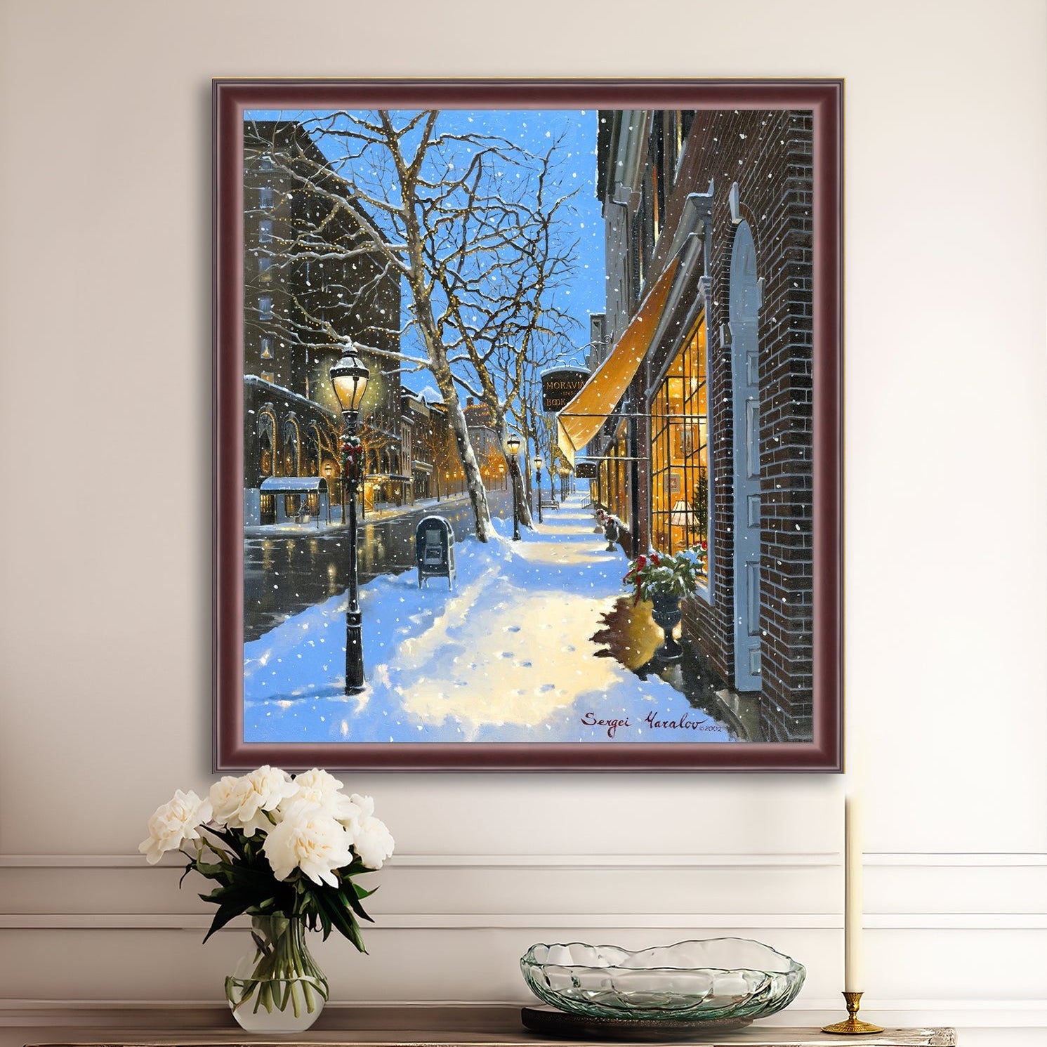 A canvas print of Moravian Bookshop, a snowy street scene in Bethlehem with footprints on the snow.