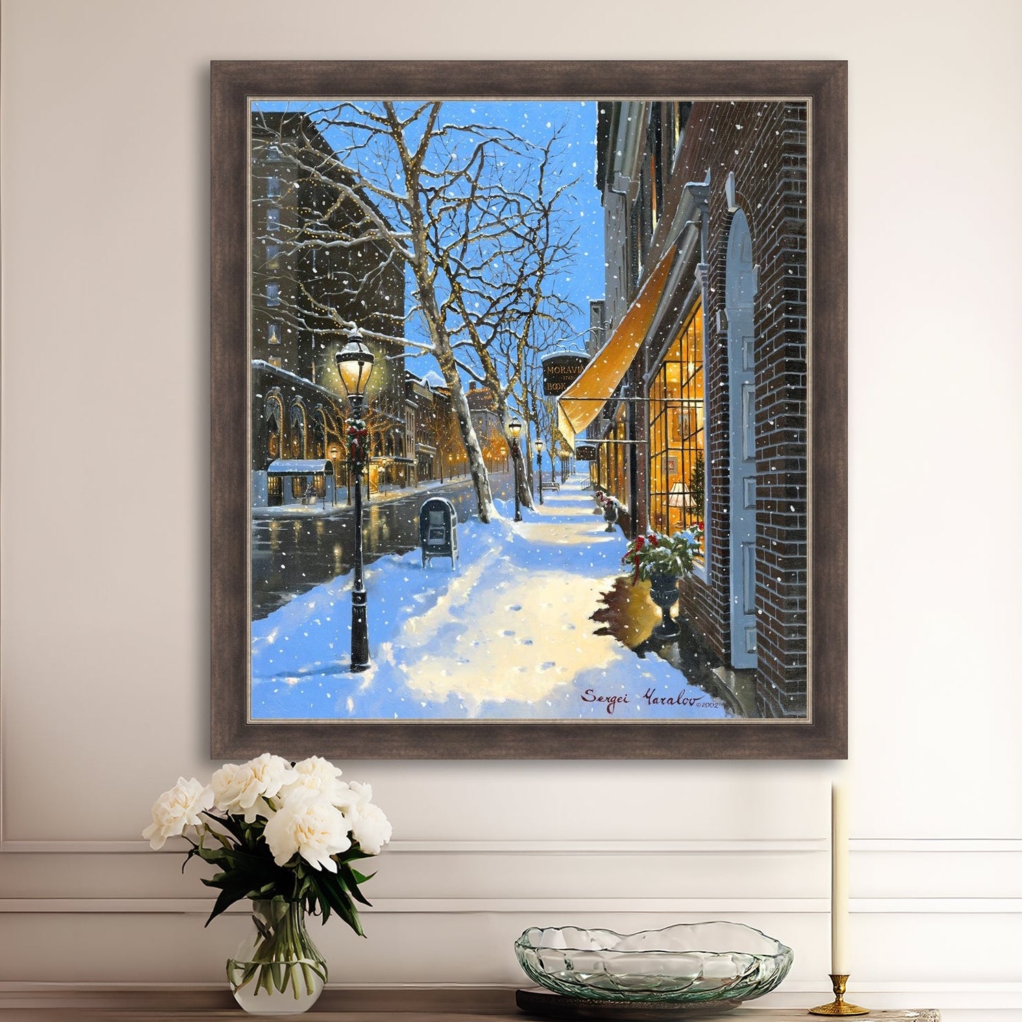 A canvas print of Moravian Bookshop, a snowy street scene in Bethlehem with footprints on the snow.