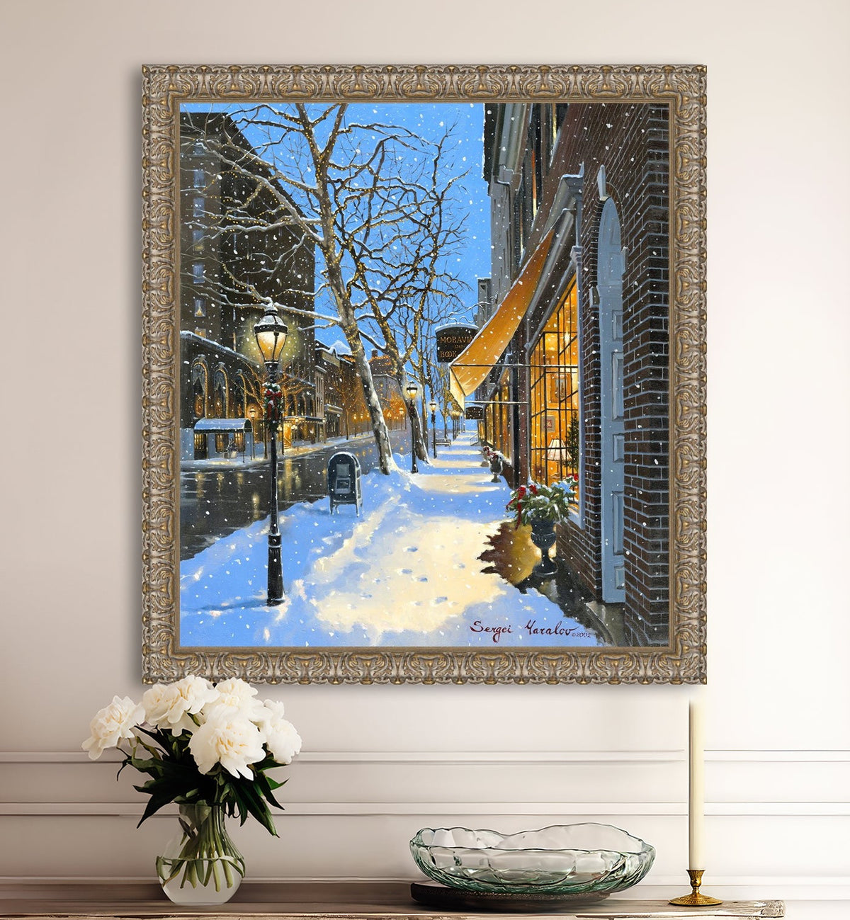 A canvas print of Moravian Bookshop, a snowy street scene in Bethlehem with footprints on the snow.