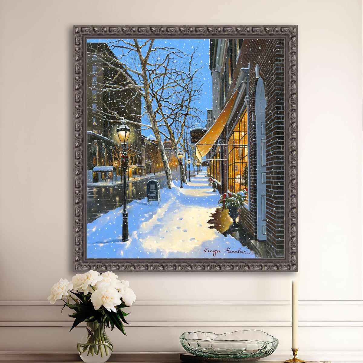 A canvas print of Moravian Bookshop, a snowy street scene in Bethlehem with footprints on the snow.