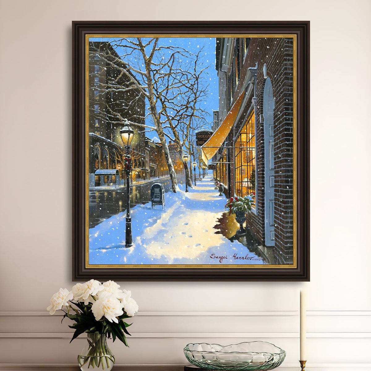 A canvas print of Moravian Bookshop, a snowy street scene in Bethlehem with footprints on the snow.
