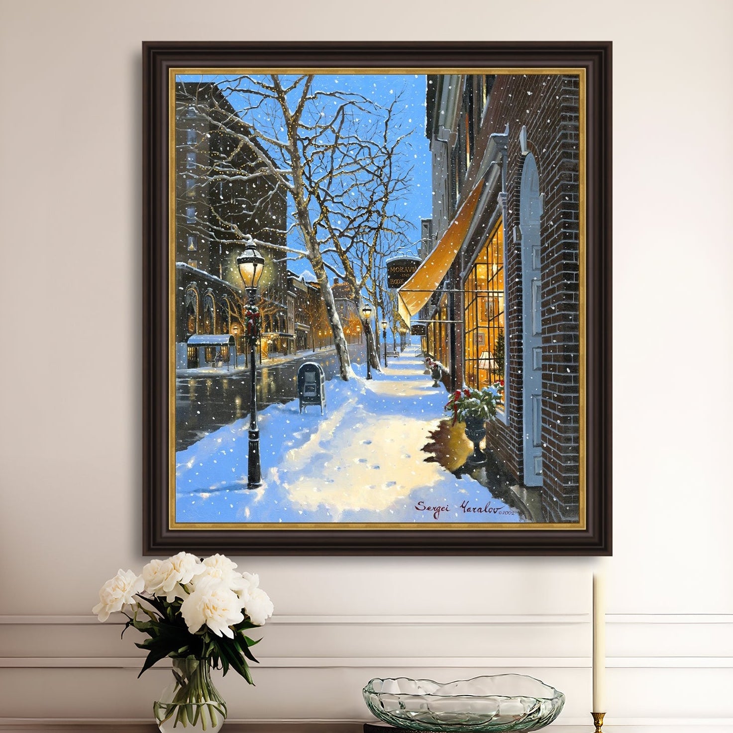 A canvas print of Moravian Bookshop, a snowy street scene in Bethlehem with footprints on the snow.