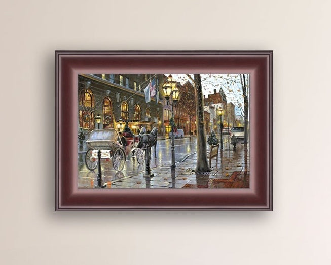 A canvas print depicting a Christmas scene with a horse-drawn carriage on a wet main street in Bethlehem with stores and Christmas lights in the background.