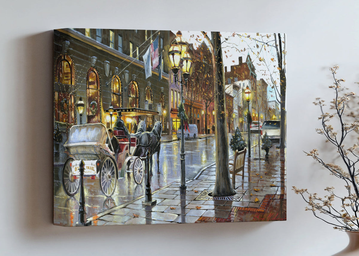 A canvas print depicting a Christmas scene with a horse-drawn carriage on a wet main street in Bethlehem with stores and Christmas lights in the background.