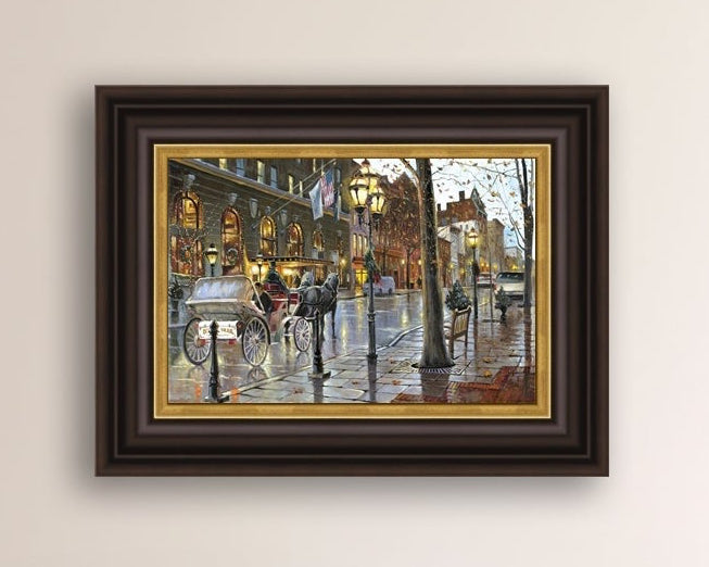 A canvas print depicting a Christmas scene with a horse-drawn carriage on a wet main street in Bethlehem with stores and Christmas lights in the background.
