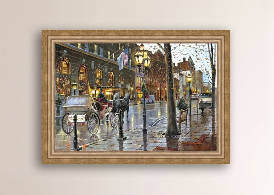 A canvas print depicting a Christmas scene with a horse-drawn carriage on a wet main street in Bethlehem with stores and Christmas lights in the background.