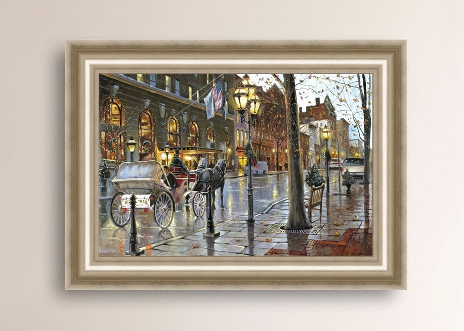 A canvas print depicting a Christmas scene with a horse-drawn carriage on a wet main street in Bethlehem with stores and Christmas lights in the background.