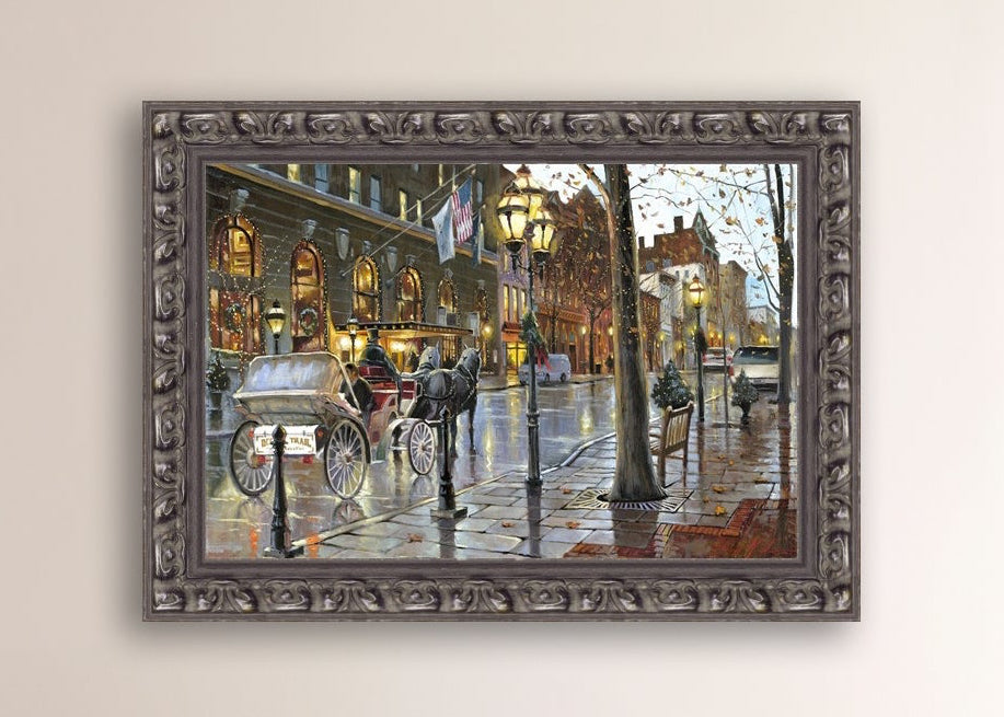 A canvas print depicting a Christmas scene with a horse-drawn carriage on a wet main street in Bethlehem with stores and Christmas lights in the background.