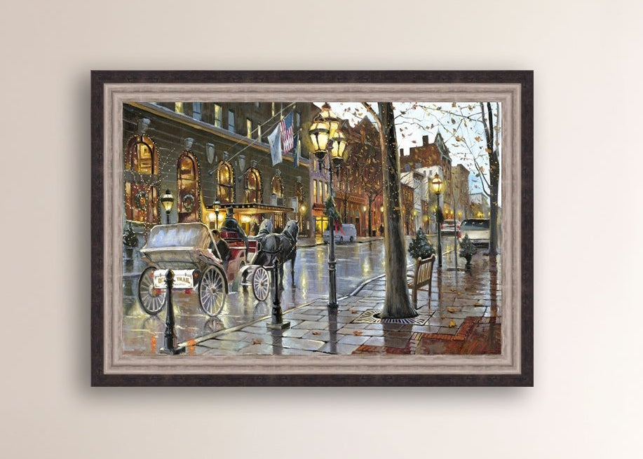 A canvas print depicting a Christmas scene with a horse-drawn carriage on a wet main street in Bethlehem with stores and Christmas lights in the background.