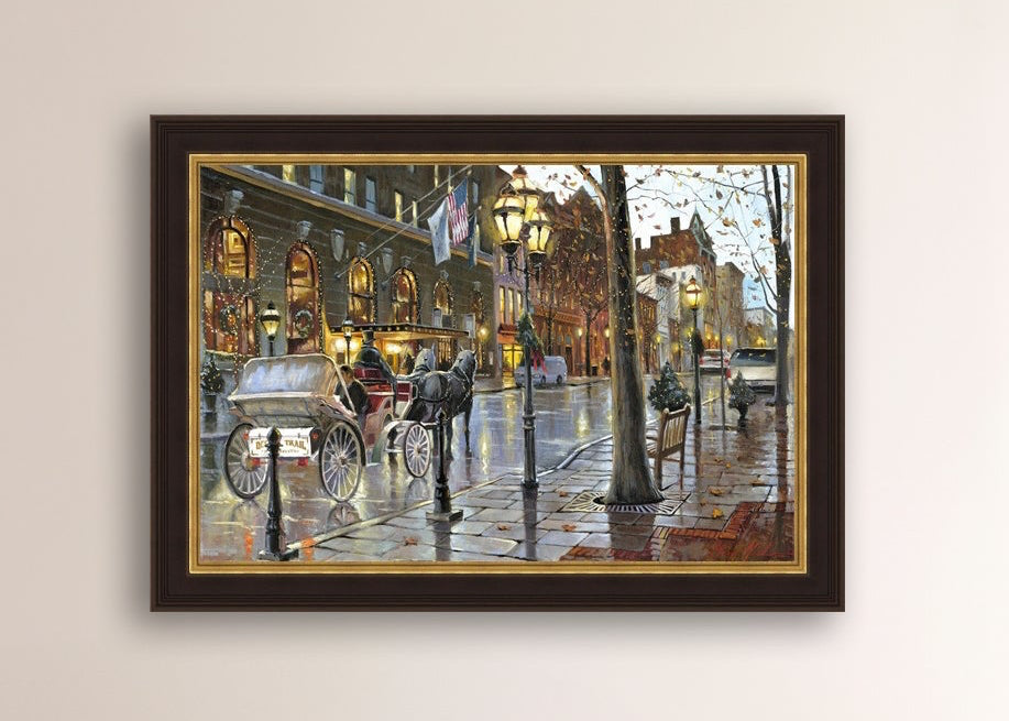 A canvas print depicting a Christmas scene with a horse-drawn carriage on a wet main street in Bethlehem with stores and Christmas lights in the background.