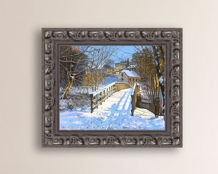 A canvas print featuring a Monocacy Bridge with snow on the ground, surrounded by trees and a historic building in the background.