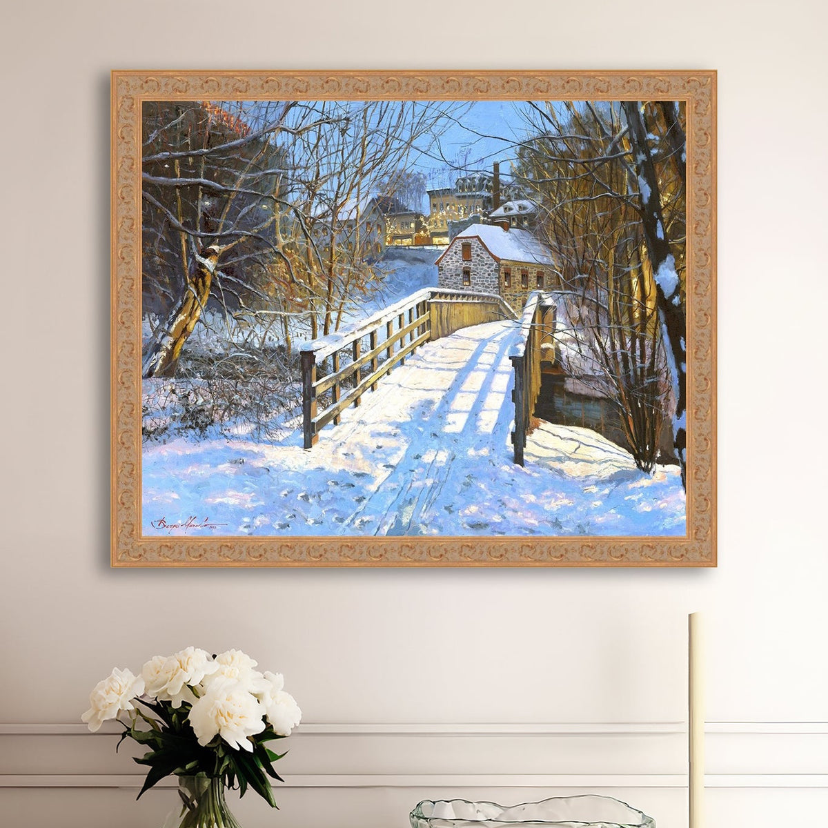 A framed canvas print featuring a Monocacy Bridge with snow on the ground, surrounded by trees and a historic Bethlehem building in the background.