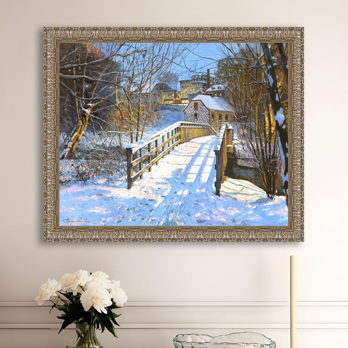 A framed canvas print featuring a Monocacy Bridge with snow on the ground, surrounded by trees and a historic Bethlehem building in the background.