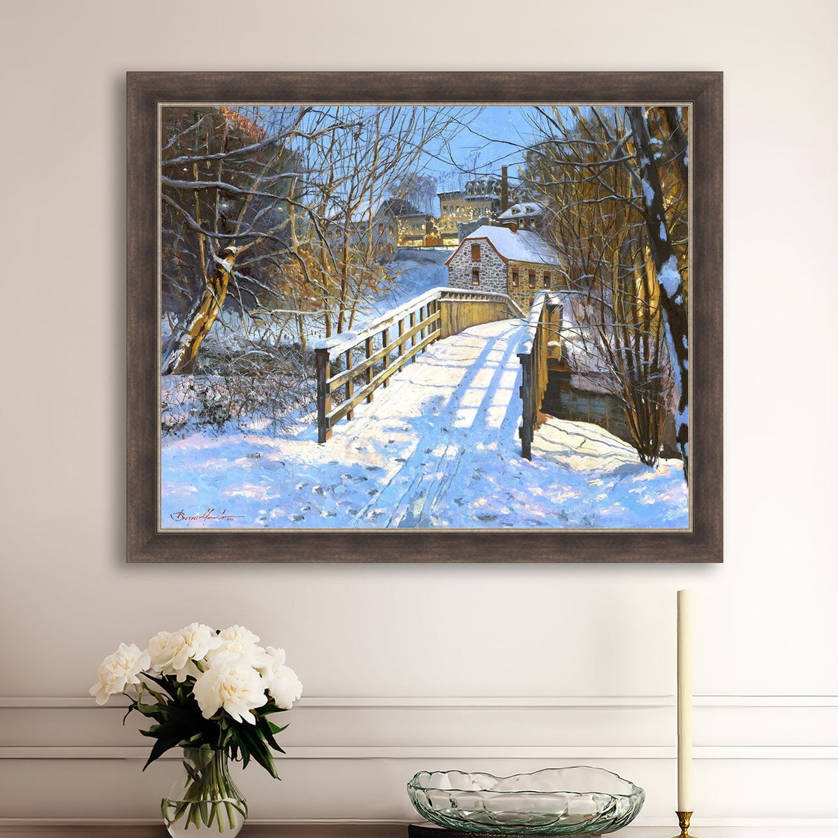A framed canvas print featuring a Monocacy Bridge with snow on the ground, surrounded by trees and a historic Bethlehem building in the background.