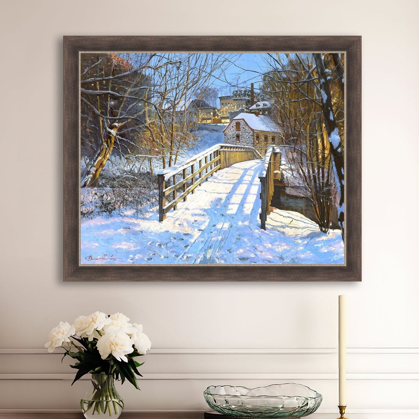 A framed canvas print featuring a Monocacy Bridge with snow on the ground, surrounded by trees and a historic Bethlehem building in the background.