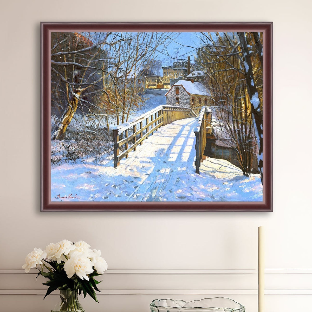 A framed canvas print featuring a Monocacy Bridge with snow on the ground, surrounded by trees and a historic Bethlehem building in the background.