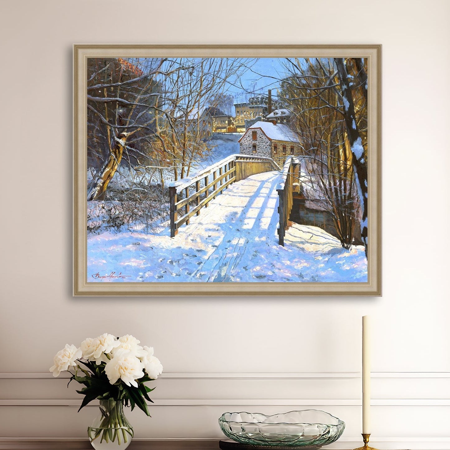 A framed canvas print featuring a Monocacy Bridge with snow on the ground, surrounded by trees and a historic Bethlehem building in the background.