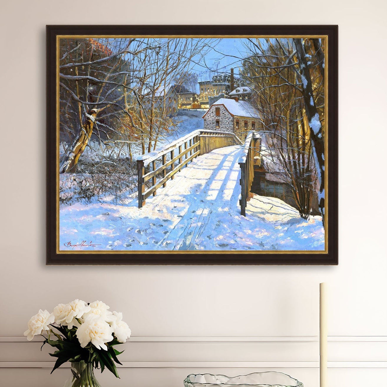 A framed canvas print featuring a Monocacy Bridge with snow on the ground, surrounded by trees and a historic Bethlehem building in the background.
