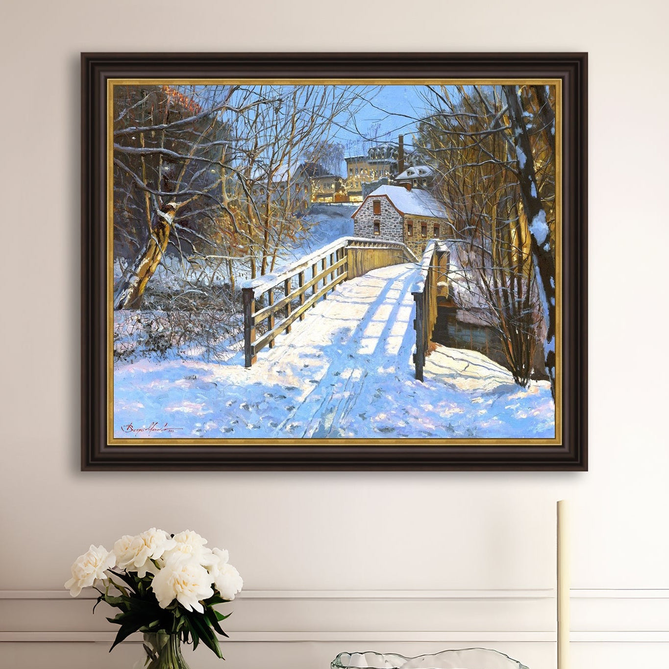 A framed canvas print featuring a Monocacy Bridge with snow on the ground, surrounded by trees and a historic Bethlehem building in the background.