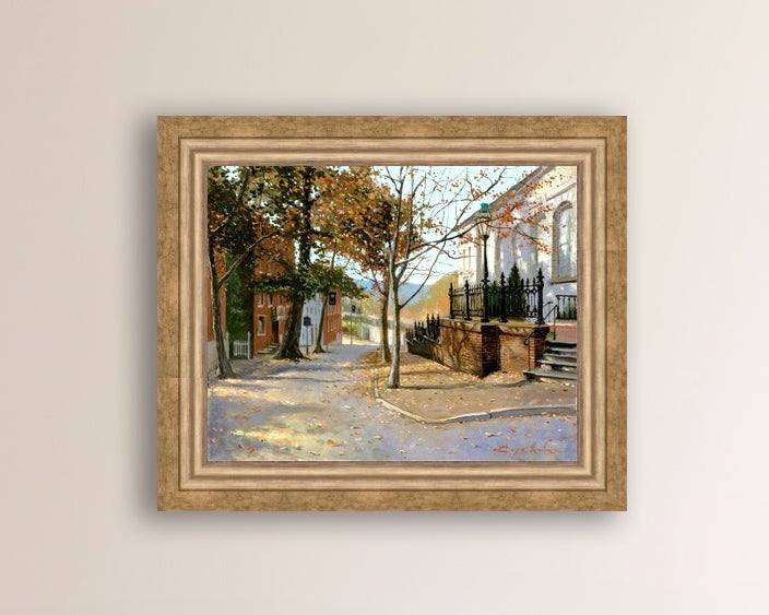 A canvas print featuring a vibrant street scene with trees and a building, titled 'Autumn Leaves on Church Street', Bethlehem 