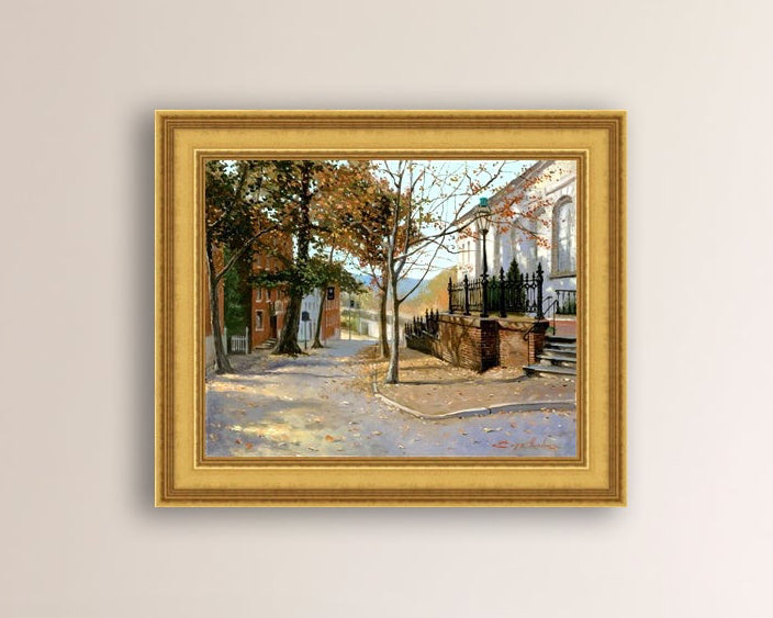 A canvas print featuring a vibrant street scene with trees and a building, titled 'Autumn Leaves on Church Street', Bethlehem 