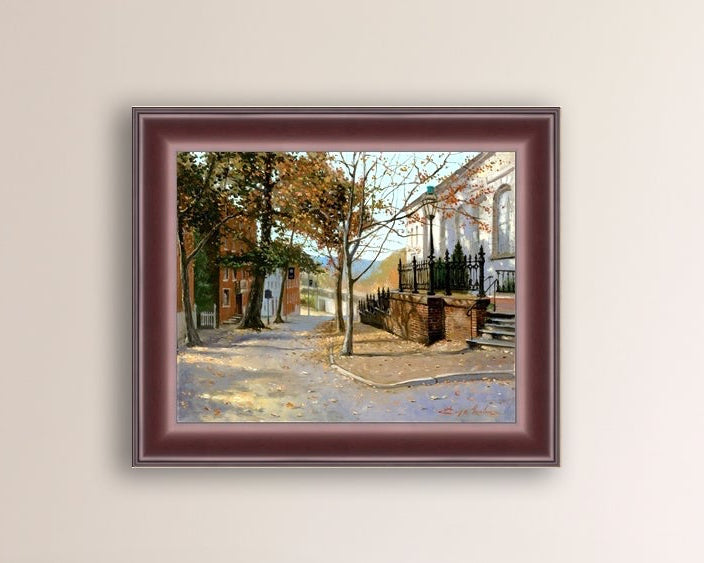 A canvas print featuring a vibrant street scene with trees and a building, titled 'Autumn Leaves on Church Street', Bethlehem 