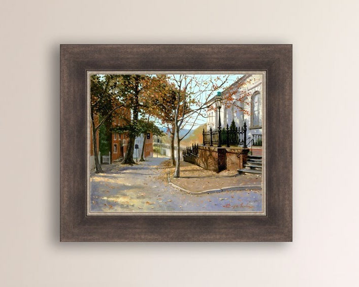 A canvas print featuring a vibrant street scene with trees and a building, titled 'Autumn Leaves on Church Street', Bethlehem 