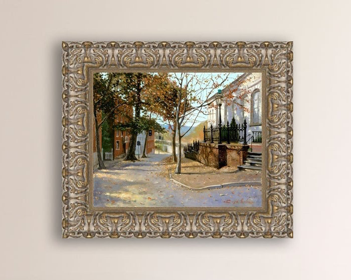 A canvas print featuring a vibrant street scene with trees and a building, titled 'Autumn Leaves on Church Street', Bethlehem 