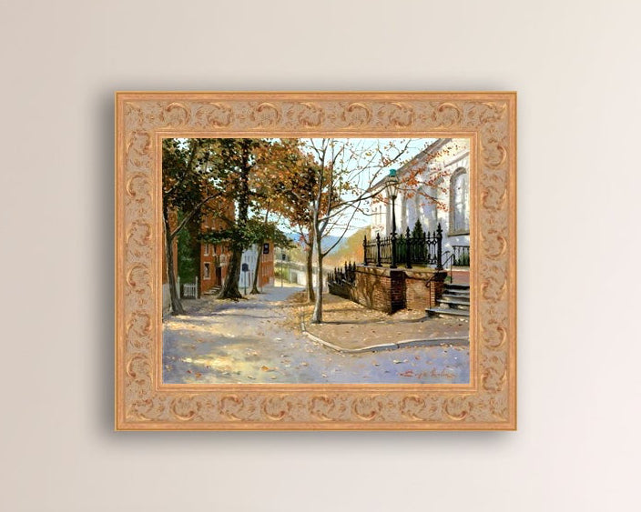 A canvas print featuring a vibrant street scene with trees and a building, titled 'Autumn Leaves on Church Street', Bethlehem 