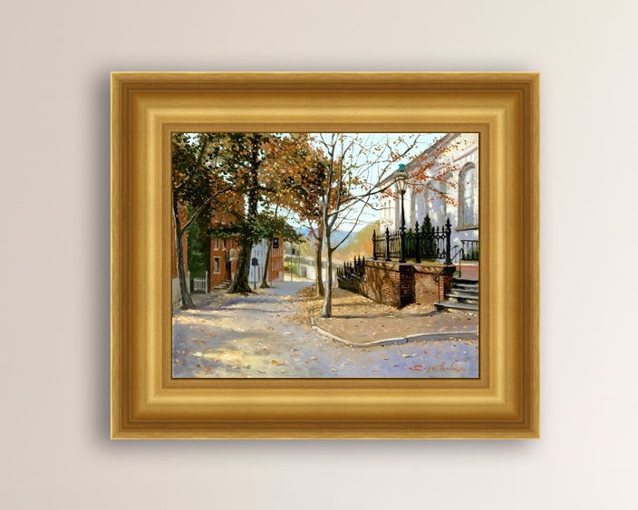 A canvas print featuring a vibrant street scene with trees and a building, titled 'Autumn Leaves on Church Street', Bethlehem 