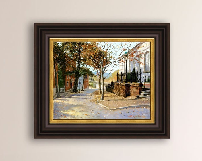 A canvas print featuring a vibrant street scene with trees and a building, titled 'Autumn Leaves on Church Street', Bethlehem 