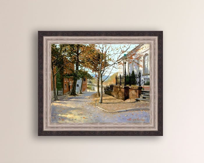 A canvas print featuring a vibrant street scene with trees and a building, titled 'Autumn Leaves on Church Street', Bethlehem 