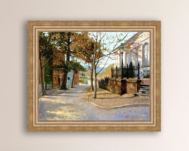 A canvas print featuring a vibrant street scene with trees and a building, titled 'Autumn Leaves on Church Street', Bethlehem 