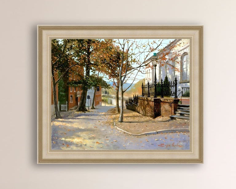 A canvas print featuring a vibrant street scene with trees and a building, titled 'Autumn Leaves on Church Street', Bethlehem 