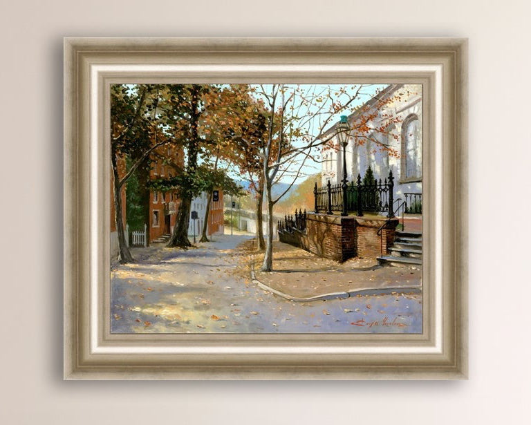 A canvas print featuring a vibrant street scene with trees and a building, titled 'Autumn Leaves on Church Street', Bethlehem 