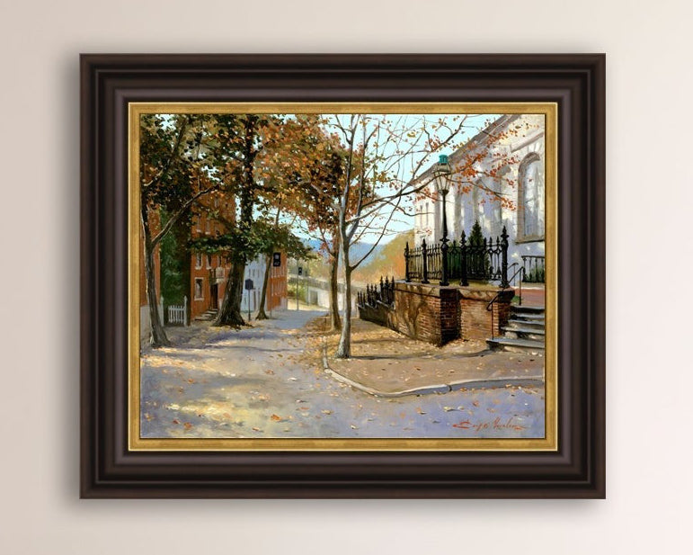 A canvas print featuring a vibrant street scene with trees and a building, titled 'Autumn Leaves on Church Street', Bethlehem 