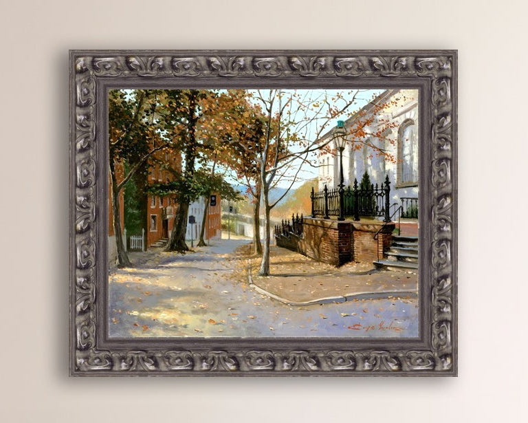 A canvas print featuring a vibrant street scene with trees and a building, titled 'Autumn Leaves on Church Street', Bethlehem 
