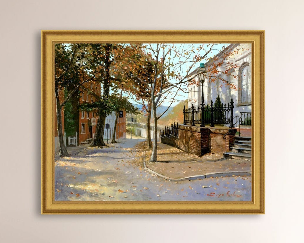 A canvas print featuring a vibrant street scene with trees and a building, titled 'Autumn Leaves on Church Street', Bethlehem 