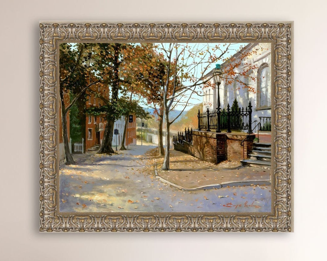 A canvas print featuring a vibrant street scene with trees and a building, titled 'Autumn Leaves on Church Street', Bethlehem 