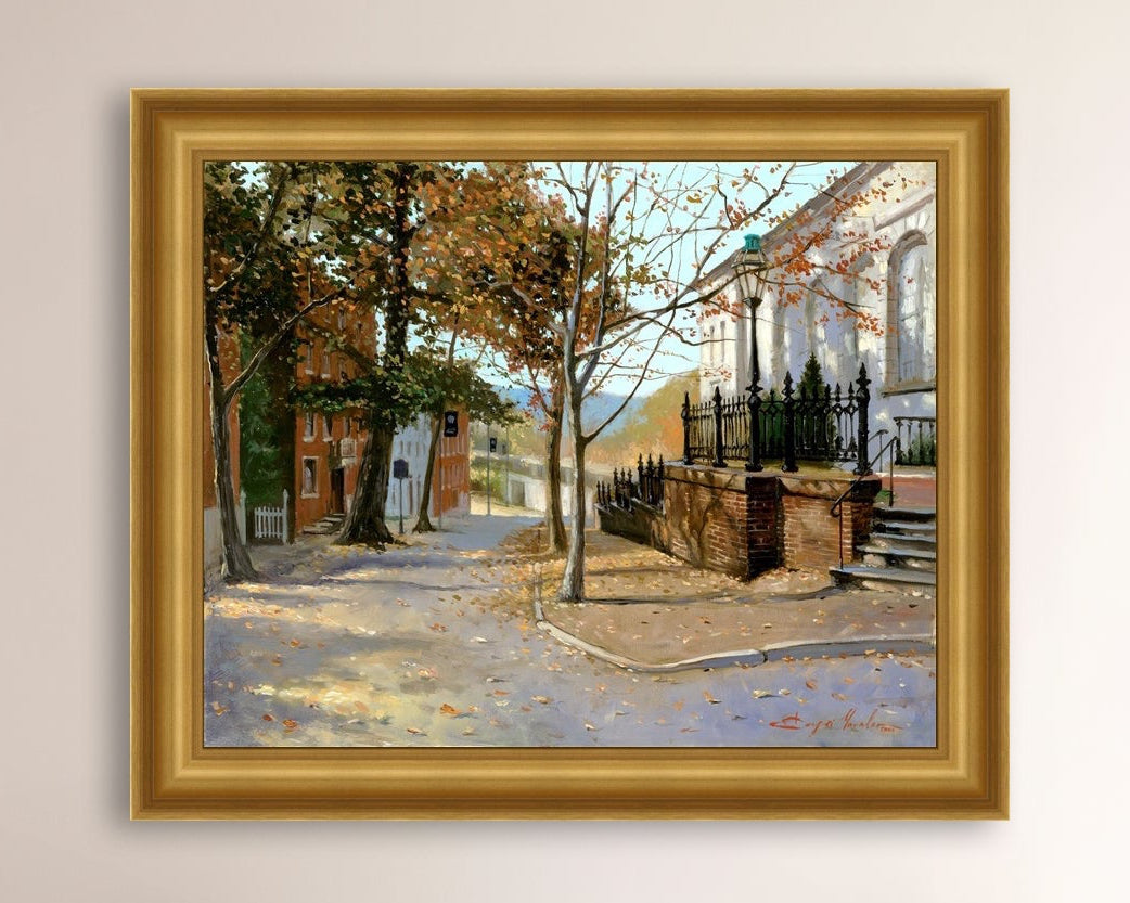 A canvas print featuring a vibrant street scene with trees and a building, titled 'Autumn Leaves on Church Street', Bethlehem 