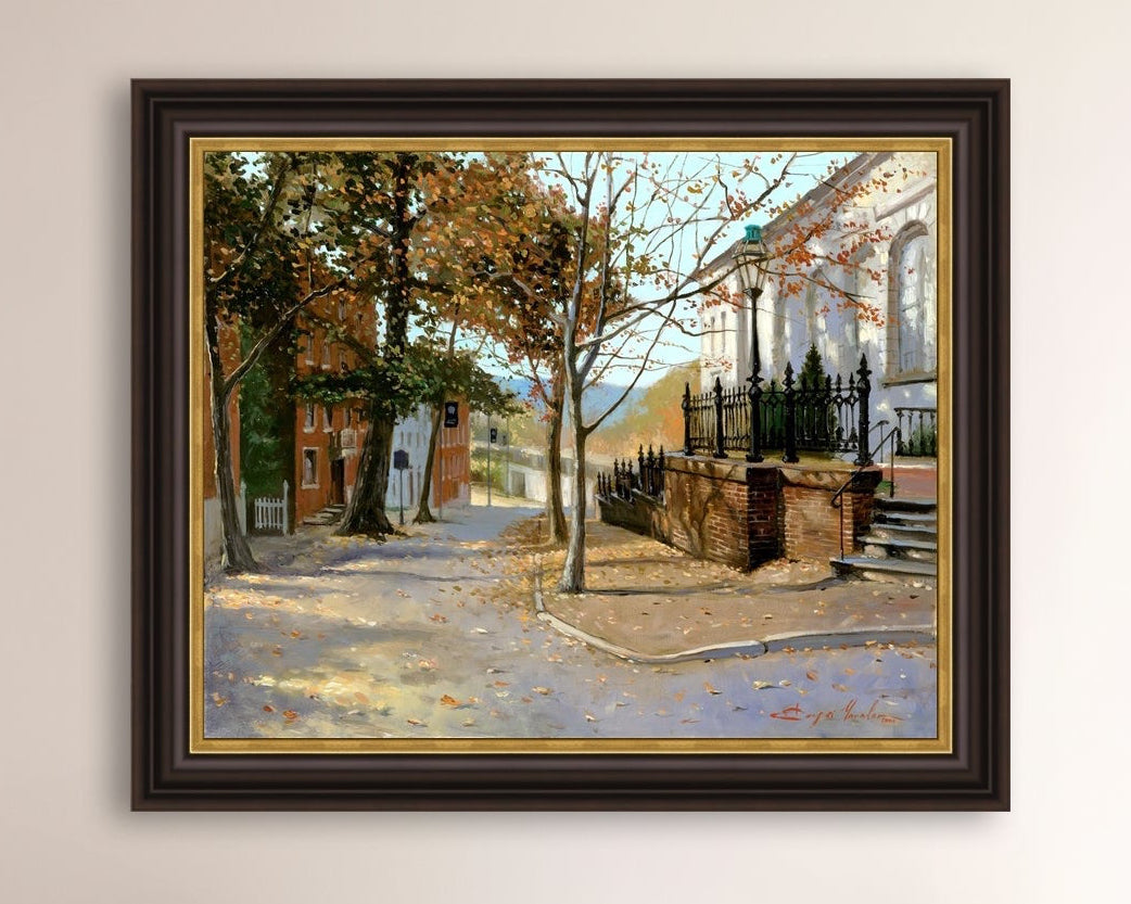 A canvas print featuring a vibrant street scene with trees and a building, titled 'Autumn Leaves on Church Street', Bethlehem 