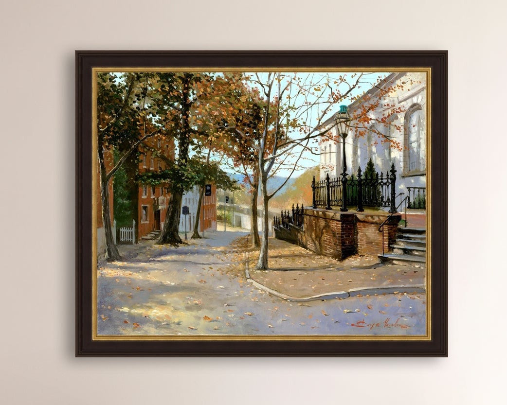 A canvas print featuring a vibrant street scene with trees and a building, titled 'Autumn Leaves on Church Street', Bethlehem 