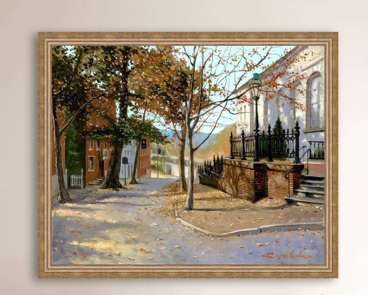 A canvas print featuring a vibrant street scene with trees and a building, titled 'Autumn Leaves on Church Street', Bethlehem 