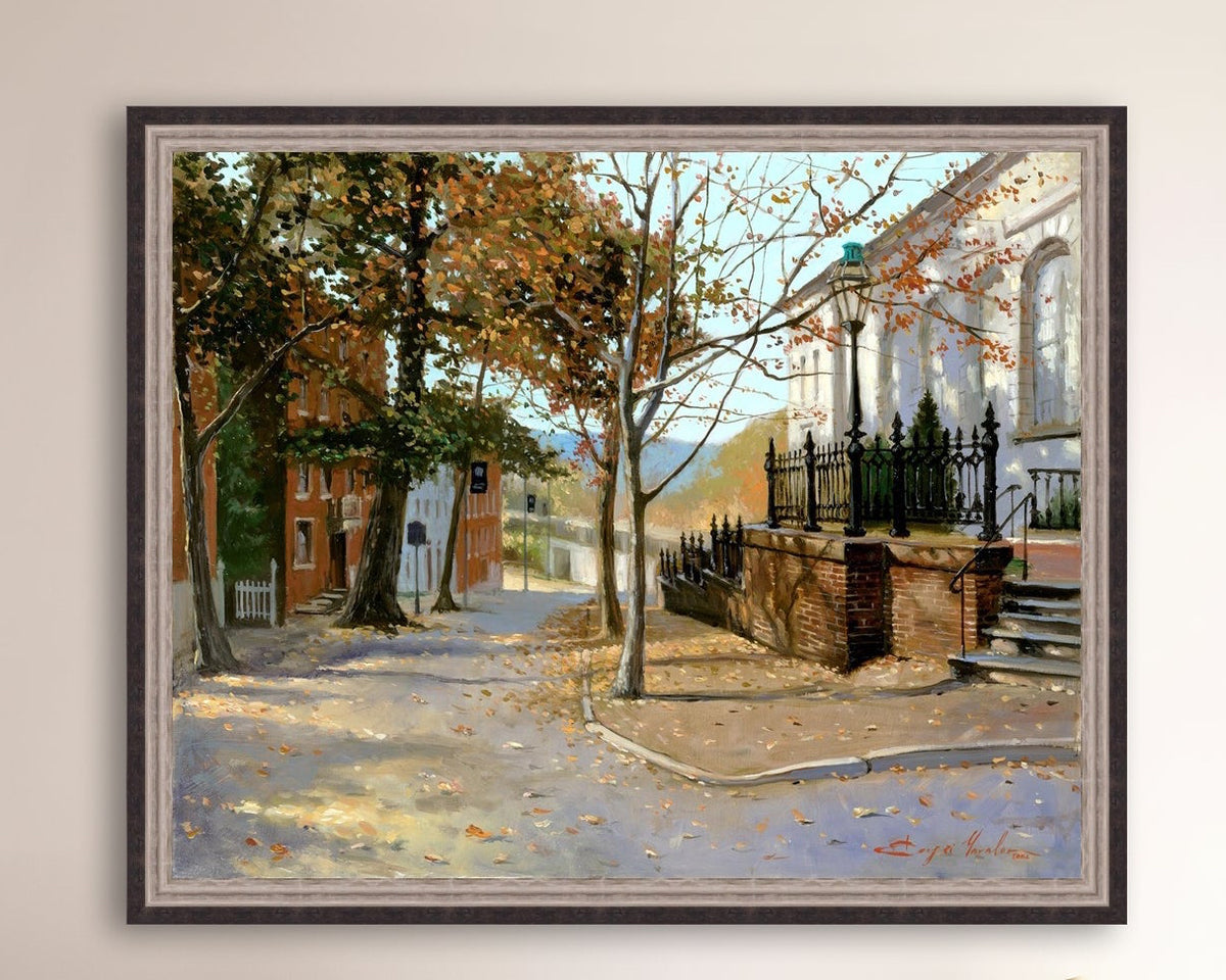 A canvas print featuring a vibrant street scene with trees and a building, titled 'Autumn Leaves on Church Street', Bethlehem 