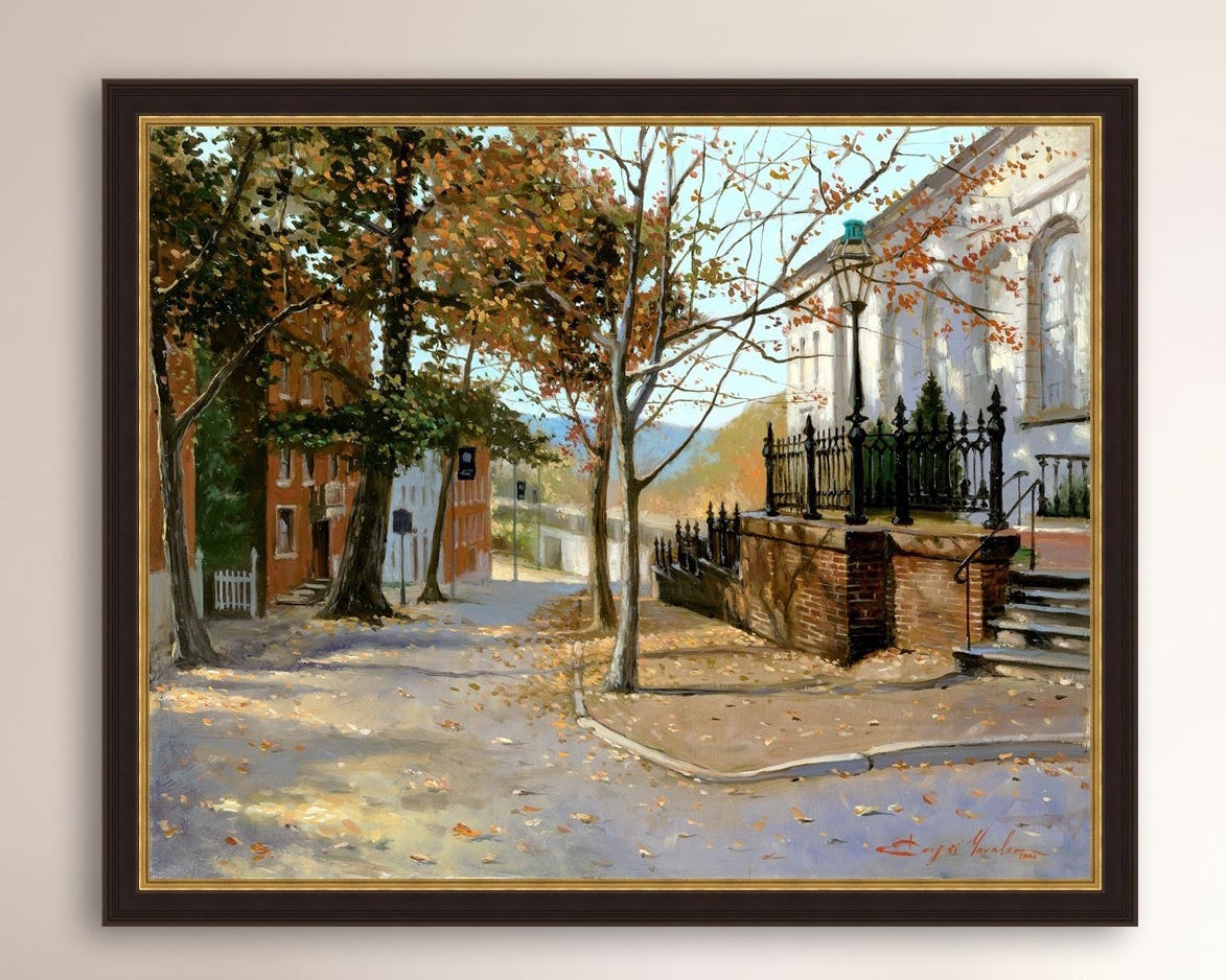 A canvas print featuring a vibrant street scene with trees and a building, titled 'Autumn Leaves on Church Street', Bethlehem 