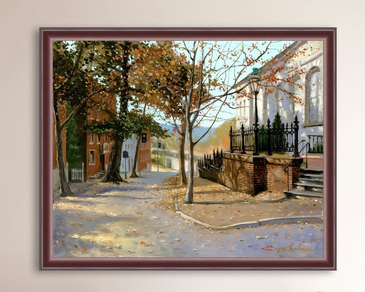 A canvas print featuring a vibrant street scene with trees and a building, titled 'Autumn Leaves on Church Street', Bethlehem 