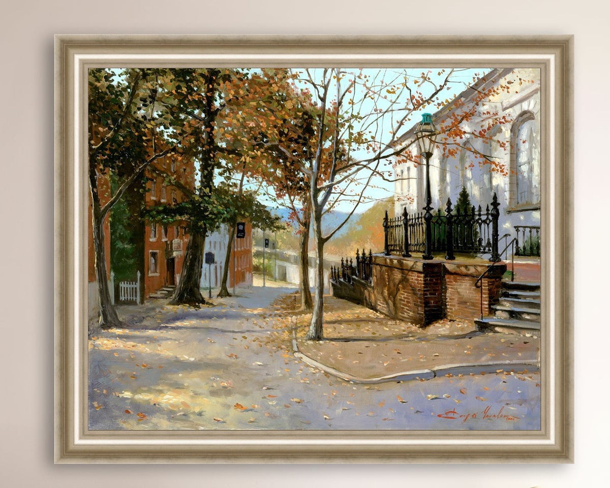 A canvas print featuring a vibrant street scene with trees and a building, titled 'Autumn Leaves on Church Street', Bethlehem 