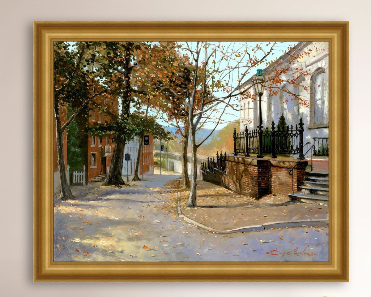 A canvas print featuring a vibrant street scene with trees and a building, titled 'Autumn Leaves on Church Street', Bethlehem 