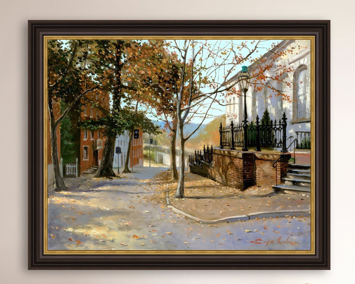 A canvas print featuring a vibrant street scene with trees and a building, titled 'Autumn Leaves on Church Street', Bethlehem 